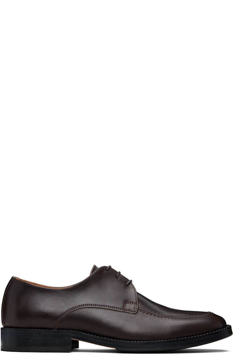 Polished leather derbys. 

· Square moc toe 
· Lace-up closure
· Aniline-dyed leather lining
· Hand-stacked leather heel and midsole
· Leather sole with rubber injections

Supplier color: Brown polido