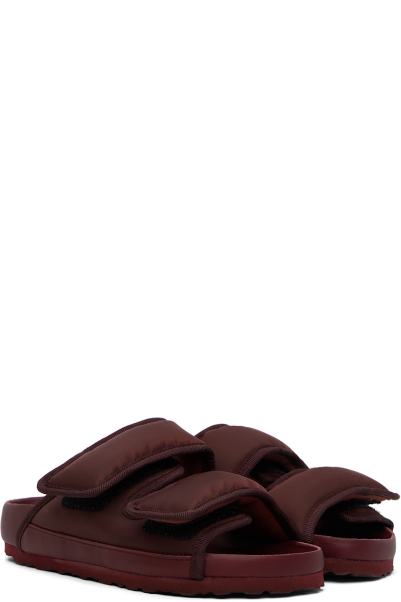Padded nylon twill flat sandals.

· Grosgrain trim throughout 
· Velcro straps at vamp
· Covered and molded cork footbed
· Treaded rubber sole 

Supplier color: Port royale