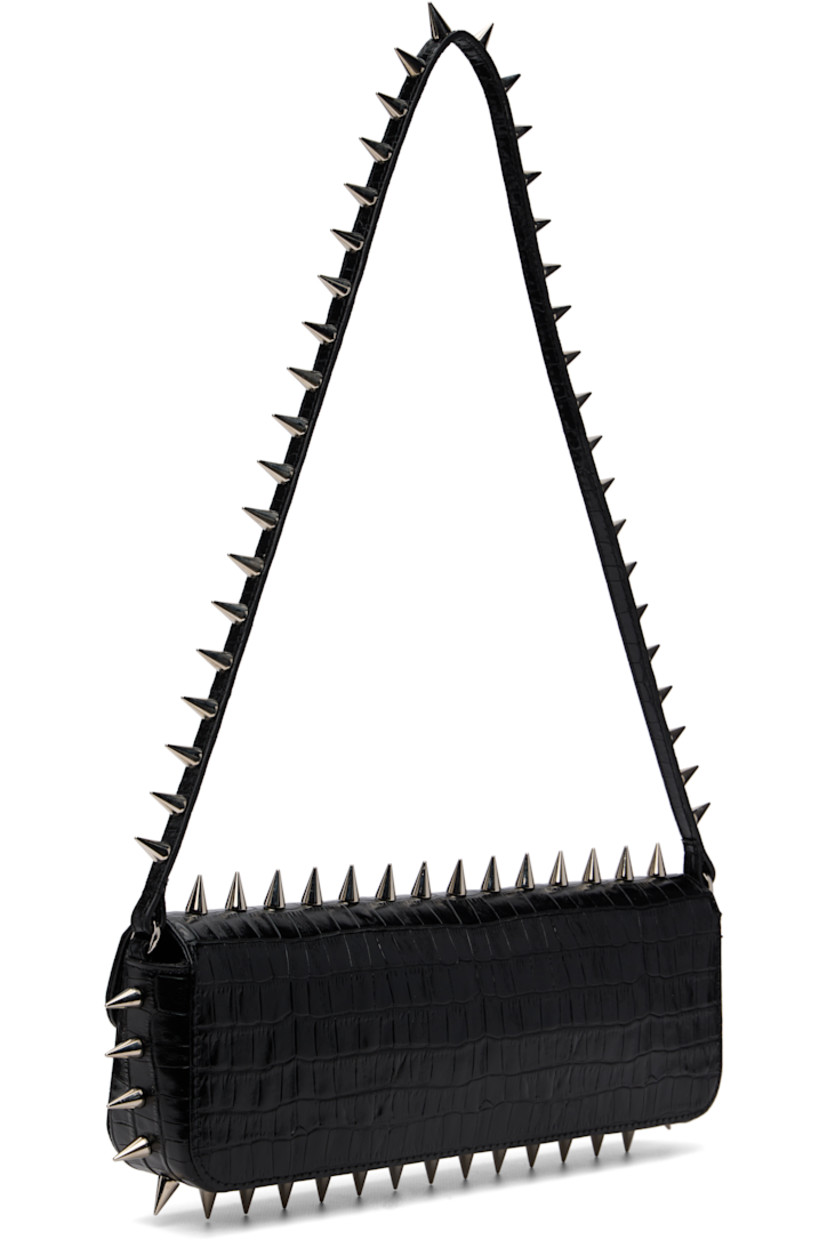 Structured croc-embossed leather shoulder bag.

· Studs throughout
· Fixed shoulder strap
· Silver-tone logo stamp at face
· Magnetic flap
· Patch pocket and D-ring at interior
· Silver-tone hardware
· H4" x W11.75" x D2"

Supplier color: Black crocco
