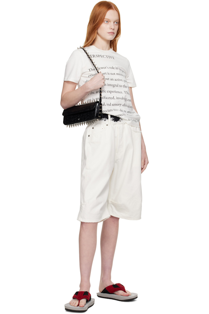 Structured croc-embossed leather shoulder bag.

· Studs throughout
· Fixed shoulder strap
· Silver-tone logo stamp at face
· Magnetic flap
· Patch pocket and D-ring at interior
· Silver-tone hardware
· H4" x W11.75" x D2"

Supplier color: Black crocco