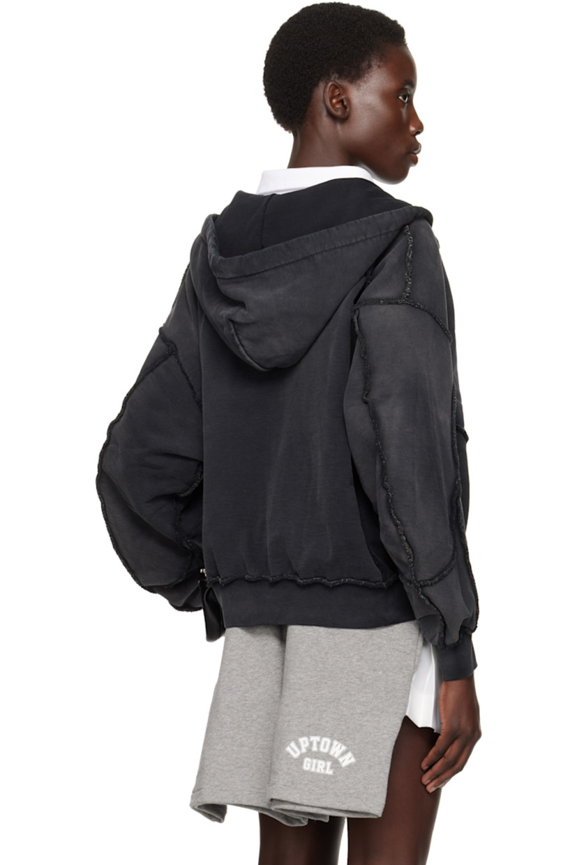 French terry hoodie. Fading and exposed seams throughout. 

· Paneled construction
· Drawstring at hood
· Zip closure
· Logo graphic printed at chest
· Raglan sleeves

Supplier color: Black