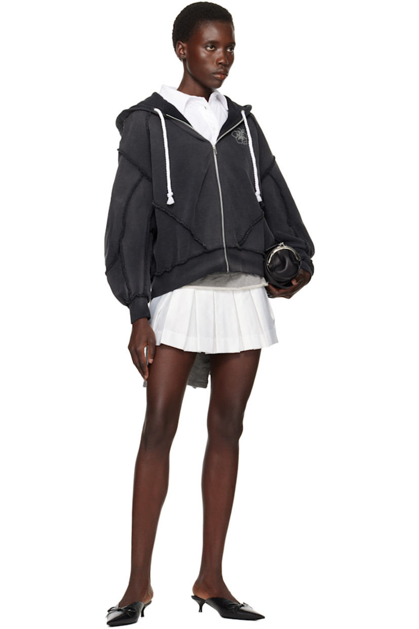 French terry hoodie. Fading and exposed seams throughout. 

· Paneled construction
· Drawstring at hood
· Zip closure
· Logo graphic printed at chest
· Raglan sleeves

Supplier color: Black
