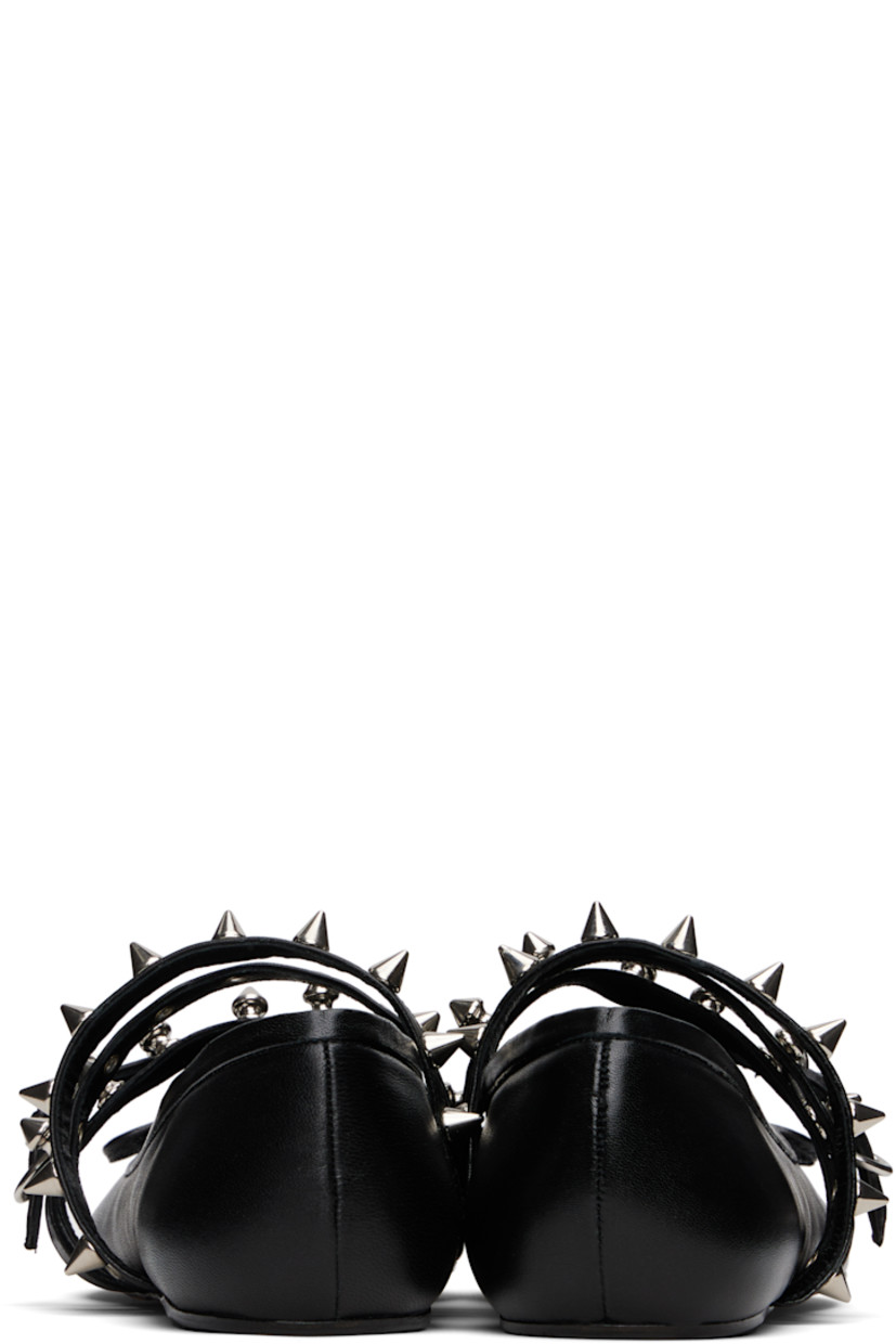 Buffed leather ballerina flats in black.

· Square toe
· Bow accent at vamp
· Pin-buckle strap with D-rings at vamp
· Grommets and studs at elasticized vamp straps
· Grained leather lining
· Suede sole with rubber injection

Supplier color: Black