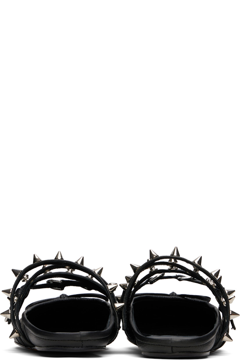 Grained leather ballerina-style mules in black.

· Square toe
· Bow accent at vamp
· Pin-buckle strap with D-rings at vamp
· Grommets and studs at elasticized vamp straps
· Logo stamp at leather footbed
· Grained leather lining
· Leather sole with rubber injection

Supplier color: Black