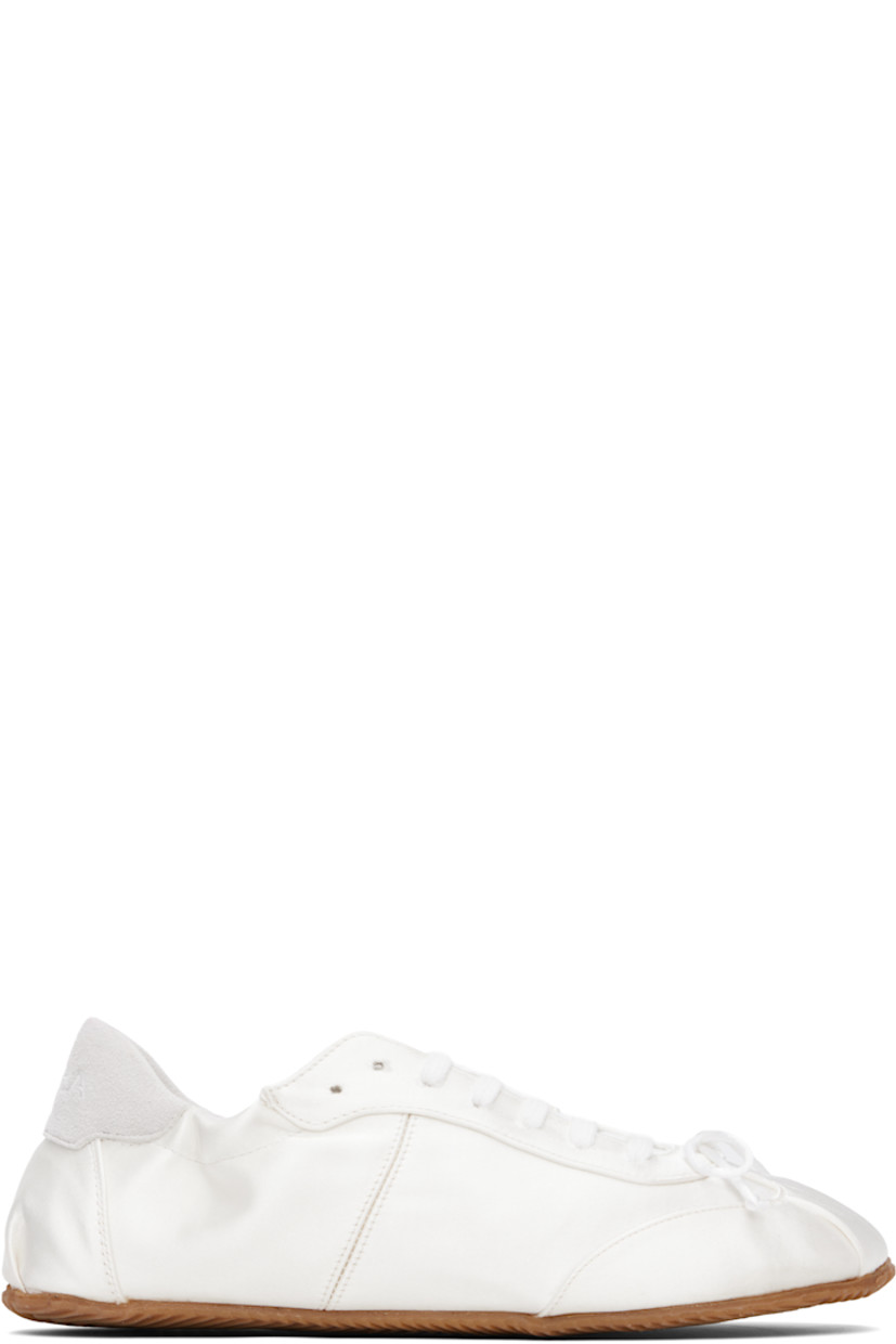 Low-top satin sneakers in white.

· Square toe
· Bow accent at vamp
· Lace-up closure
· Logo embroidered at padded tongue
· Elasticized collar
· Logo embroidered at suede heel tab
· Nubuck and jersey lining
· Treaded rubber sole

Supplier color: White