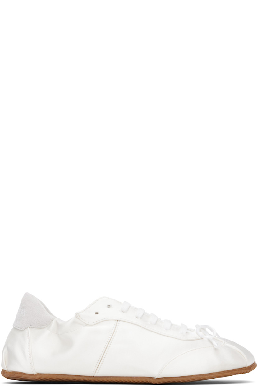 Low-top satin sneakers in white.

· Square toe
· Bow accent at vamp
· Lace-up closure
· Logo embroidered at padded tongue
· Elasticized collar
· Logo embroidered at suede heel tab
· Nubuck and jersey lining
· Treaded rubber sole

Supplier color: White