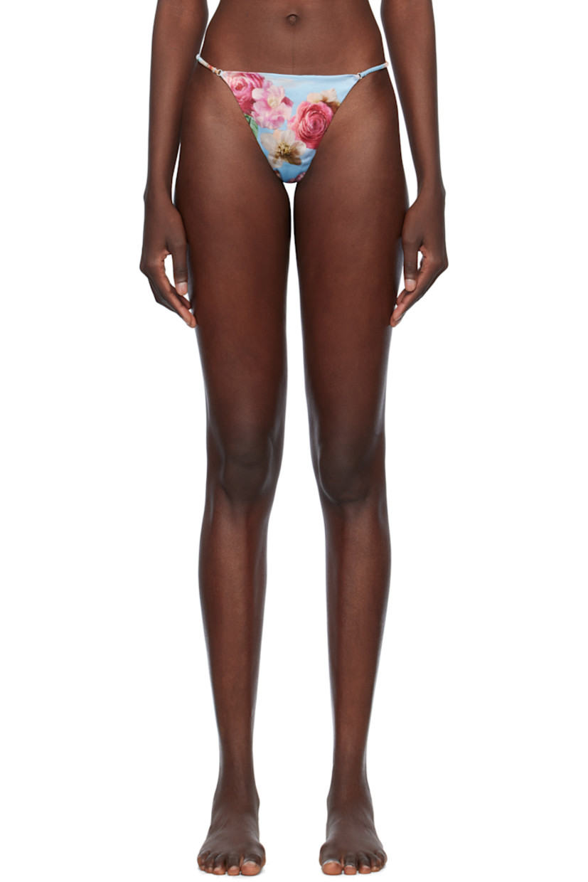 Stretch silk satin thong. Floral pattern printed throughout.

· Elasticized waistband
· Partial cotton jersey lining

Supplier color: Dream of fleur print