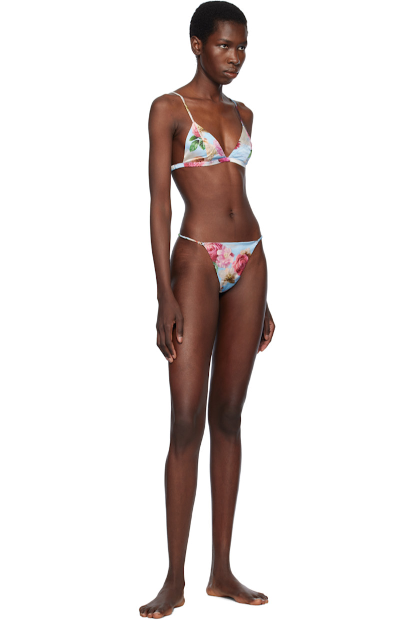 Stretch silk satin thong. Floral pattern printed throughout.

· Elasticized waistband
· Partial cotton jersey lining

Supplier color: Dream of fleur print