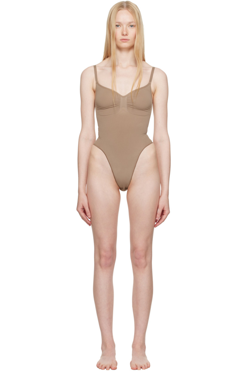Stretch nylon jersey bodysuit.

· Sweetheart neck
· Ruching at chest
· High-compression waist
· Press-stud fastening at bottom
· Adjustable elasticized spaghetti straps
· Low back
· Partial cotton lining

Supplier color: Sienna
