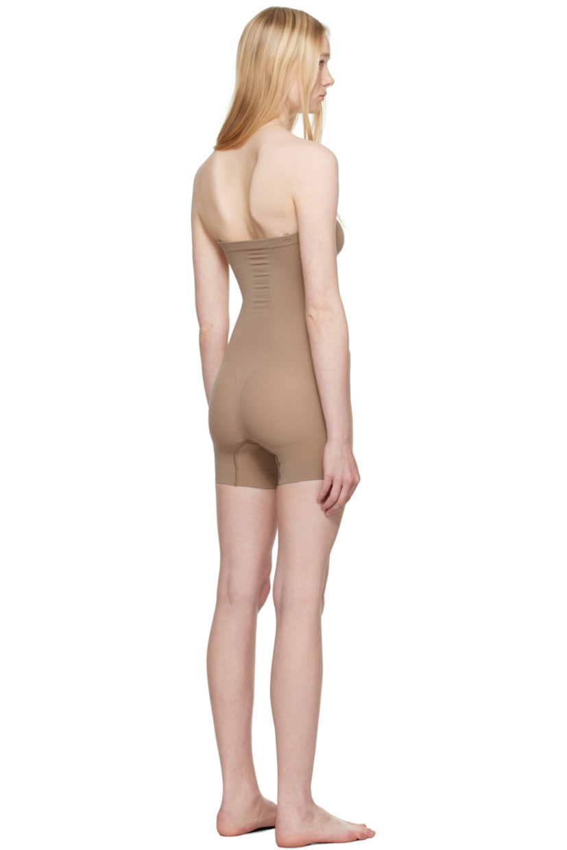 Stretch recycled nylon-blend jersey bodysuit. Includes adjustable and detachable shoulder straps for alternate styling.

· Elasticized straight neck
· Ruching at chest
· High-compression waist
· Lapped gusset at bottom

Supplier color: Sienna