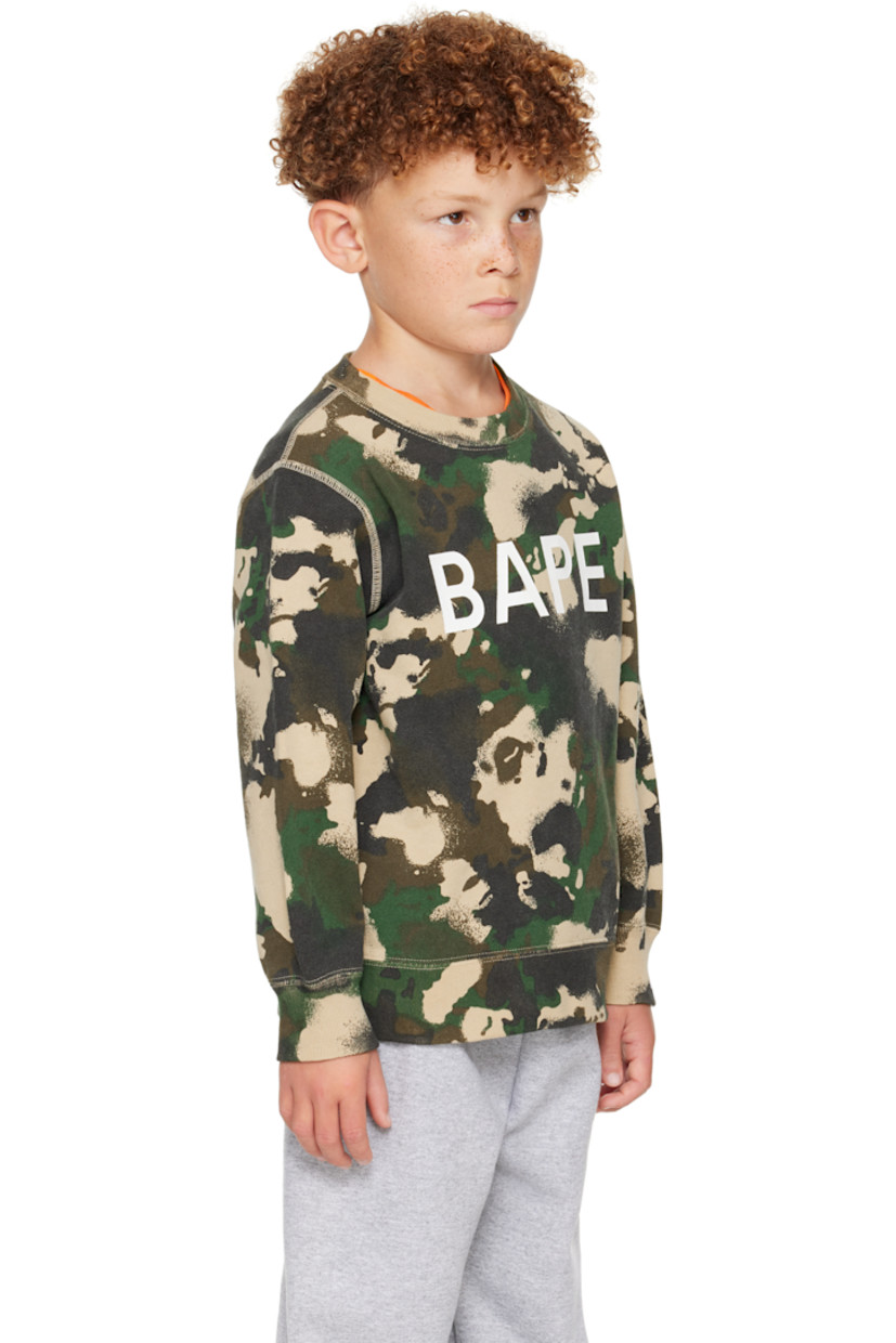 French terry sweatshirt.

· Logo graphic camouflage pattern printed throughout
· Rib-knit crewneck, hem, and cuffs
· Logo printed at chest
· Logo flag at cuff
· Machine-wash

Supplier color: Green

Model measures 48.5" / 123.2 cm tall and wears size 120.

BAPE Size: child's height
70: 25.5-29.5" / 65-75 cm 
80: 29.5-33.5" / 75-85 cm 
90: 33.5-37.5" / 85-95 cm 
100: 37.5-41.5" / 95-105 cm 
110: 41.5-45.5" / 105-115 cm 
120: 45.5-49" / 115-125 cm 
130: 49-53" / 125-135 cm 
140: 53-57" / 135-145 cm 
150: 57-61" / 145-155 cm 
160: 61-65" / 155-165 cm