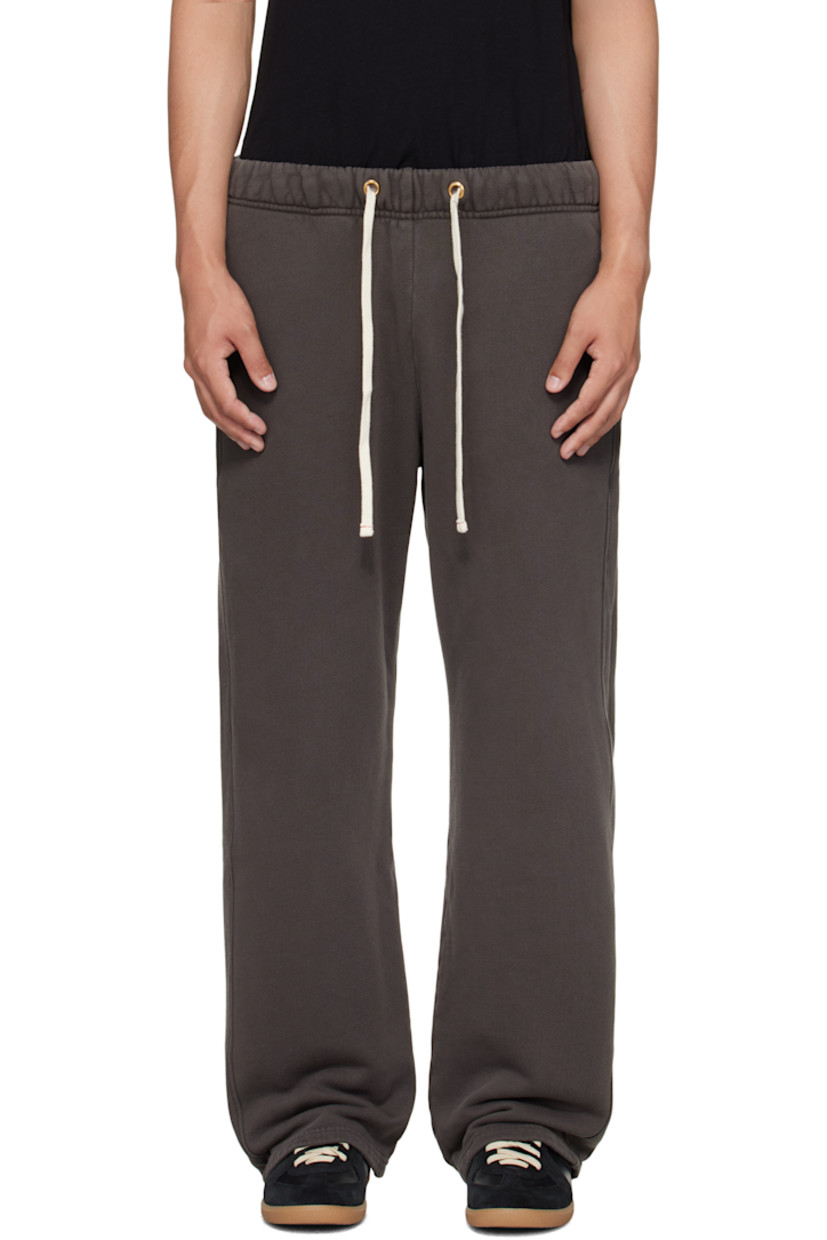 Heavyweight brushed cotton fleece sweatpants.

· Pre-shrunk and garment-dyed
· Fading throughout
· Drawstring at elasticized waistband
· Two-pocket styling

Supplier color: Vintage black