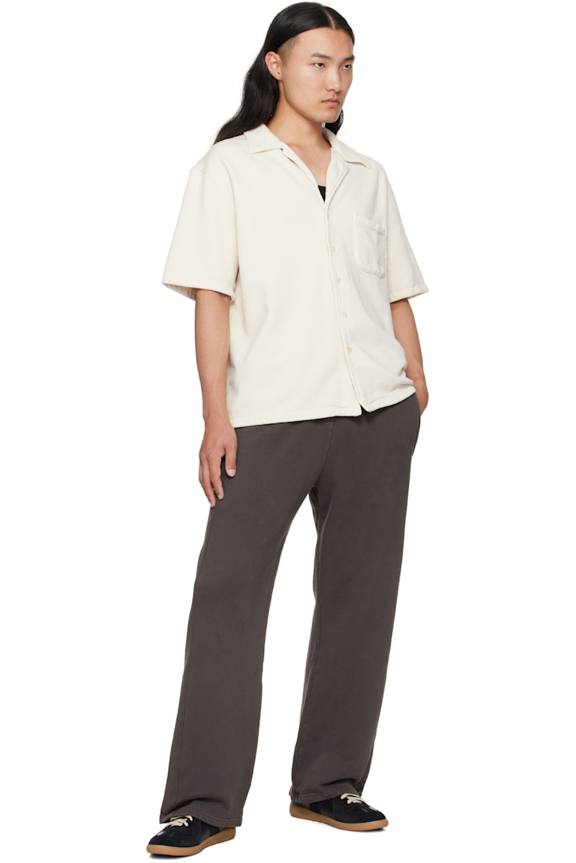 Heavyweight brushed cotton fleece sweatpants.

· Pre-shrunk and garment-dyed
· Fading throughout
· Drawstring at elasticized waistband
· Two-pocket styling

Supplier color: Vintage black