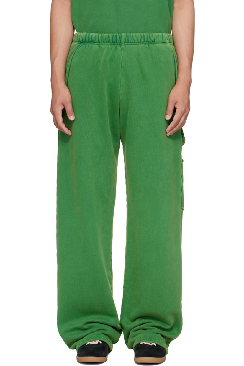 Heavyweight brushed cotton fleece sweatpants.

· Pre-shrunk and garment-dyed
· Fading throughout
· Concealed drawstring at elasticized waistband
· Four-pocket styling
· Hammer loop and patch pocket at outseam
· Rolled raw edges at back pockets

Supplier color: Washed basil