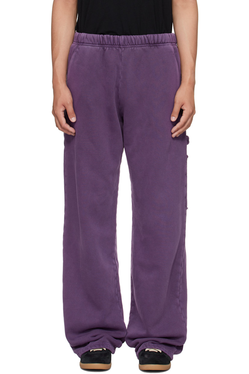 Heavyweight brushed cotton fleece sweatpants.

· Pre-shrunk and garment-dyed
· Fading throughout
· Concealed drawstring at elasticized waistband
· Four-pocket styling
· Hammer loop and patch pocket at outseam
· Rolled raw edges at back pockets

Supplier color: Washed violet
