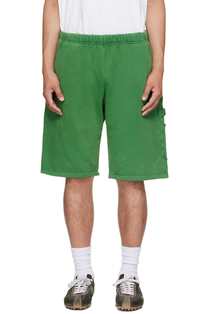 Heavyweight brushed cotton fleece shorts.

· Pre-shrunk and garment-dyed
· Fading throughout
· Concealed drawstring at elasticized waistband
· Four-pocket styling
· Hammer loop and patch pocket at outseam
· Rolled raw edges at back pockets

Supplier color: Washed basil