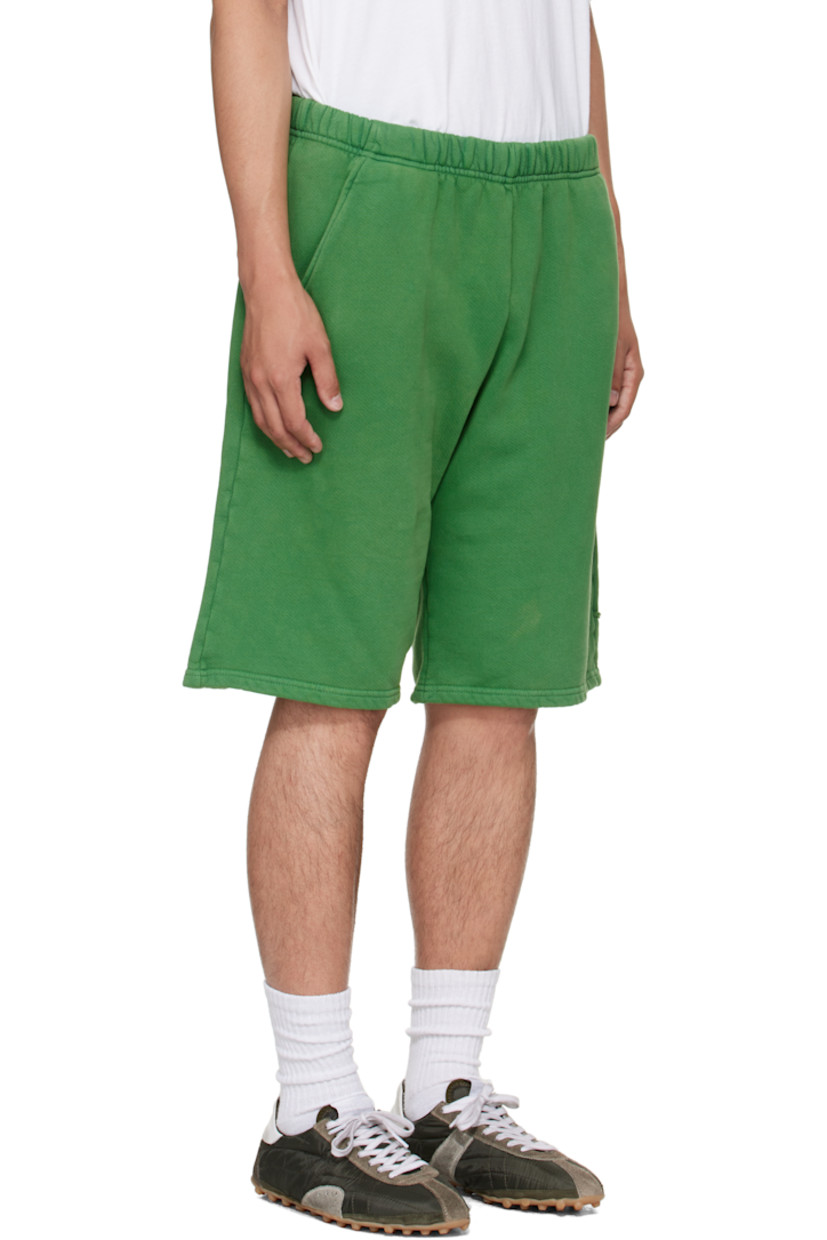 Heavyweight brushed cotton fleece shorts.

· Pre-shrunk and garment-dyed
· Fading throughout
· Concealed drawstring at elasticized waistband
· Four-pocket styling
· Hammer loop and patch pocket at outseam
· Rolled raw edges at back pockets

Supplier color: Washed basil