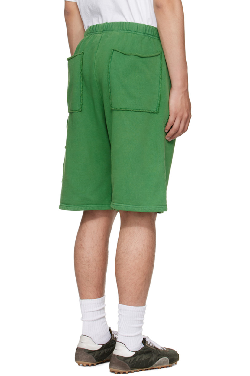 Heavyweight brushed cotton fleece shorts.

· Pre-shrunk and garment-dyed
· Fading throughout
· Concealed drawstring at elasticized waistband
· Four-pocket styling
· Hammer loop and patch pocket at outseam
· Rolled raw edges at back pockets

Supplier color: Washed basil