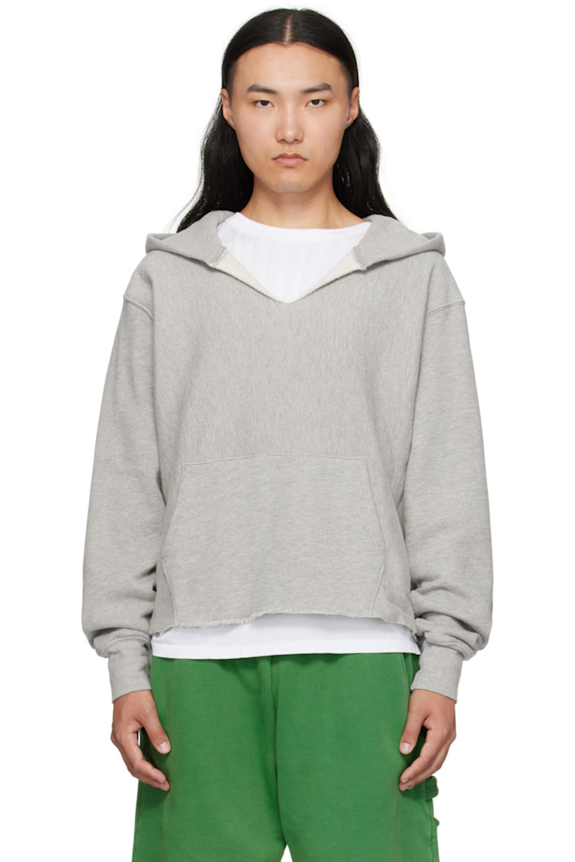 Heavyweight brushed cotton fleece hoodie.

· Pre-shrunk and garment-dyed
· Eyelets at hood
· Raw edge at V-neck and cropped hem
· Kangaroo pocket
· Jersey gusset at side seams
· Dropped shoulders
· Rib-knit cuffs

Supplier color: Heather grey