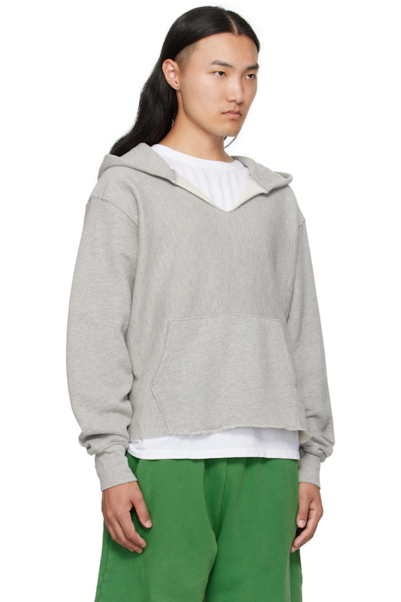 Heavyweight brushed cotton fleece hoodie.

· Pre-shrunk and garment-dyed
· Eyelets at hood
· Raw edge at V-neck and cropped hem
· Kangaroo pocket
· Jersey gusset at side seams
· Dropped shoulders
· Rib-knit cuffs

Supplier color: Heather grey