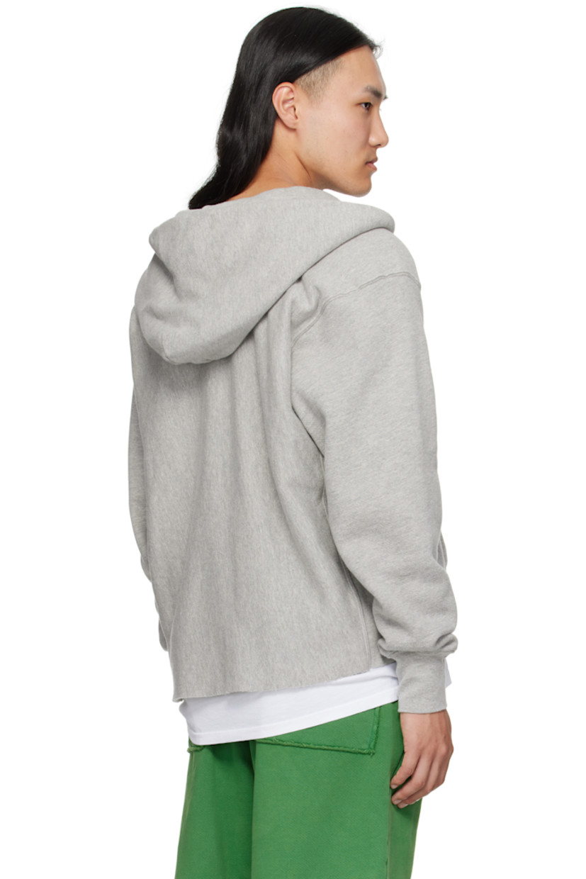 Heavyweight brushed cotton fleece hoodie.

· Pre-shrunk and garment-dyed
· Eyelets at hood
· Raw edge at V-neck and cropped hem
· Kangaroo pocket
· Jersey gusset at side seams
· Dropped shoulders
· Rib-knit cuffs

Supplier color: Heather grey