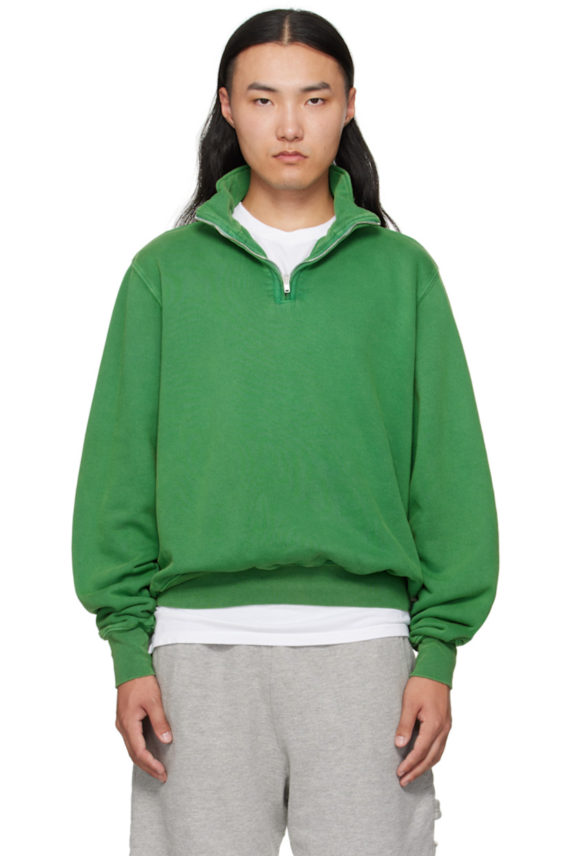 Heavyweight brushed cotton fleece sweatshirt.

· Pre-shrunk and garment-dyed
· Fading throughout
· Stand collar
· Half-zip closure
· Rib-knit hem and cuffs
· Dropped shoulders

Supplier color: Washed basil