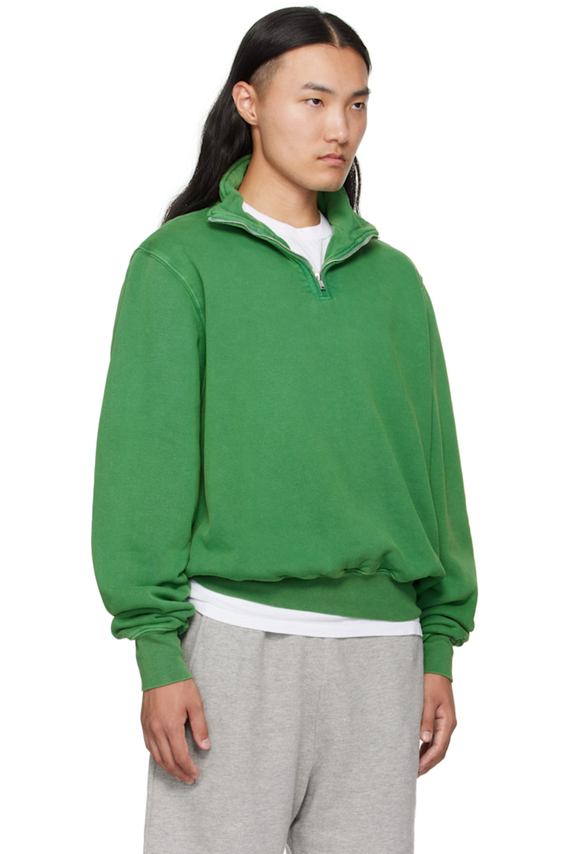 Heavyweight brushed cotton fleece sweatshirt.

· Pre-shrunk and garment-dyed
· Fading throughout
· Stand collar
· Half-zip closure
· Rib-knit hem and cuffs
· Dropped shoulders

Supplier color: Washed basil