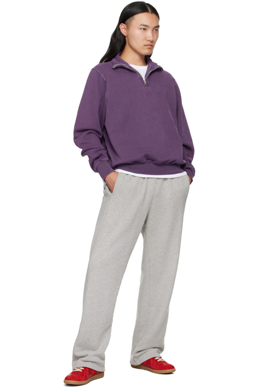 Heavyweight brushed cotton fleece sweatshirt.

· Pre-shrunk and garment-dyed
· Fading throughout
· Stand collar
· Half-zip closure
· Rib-knit hem and cuffs
· Dropped shoulders

Supplier color: Washed violet