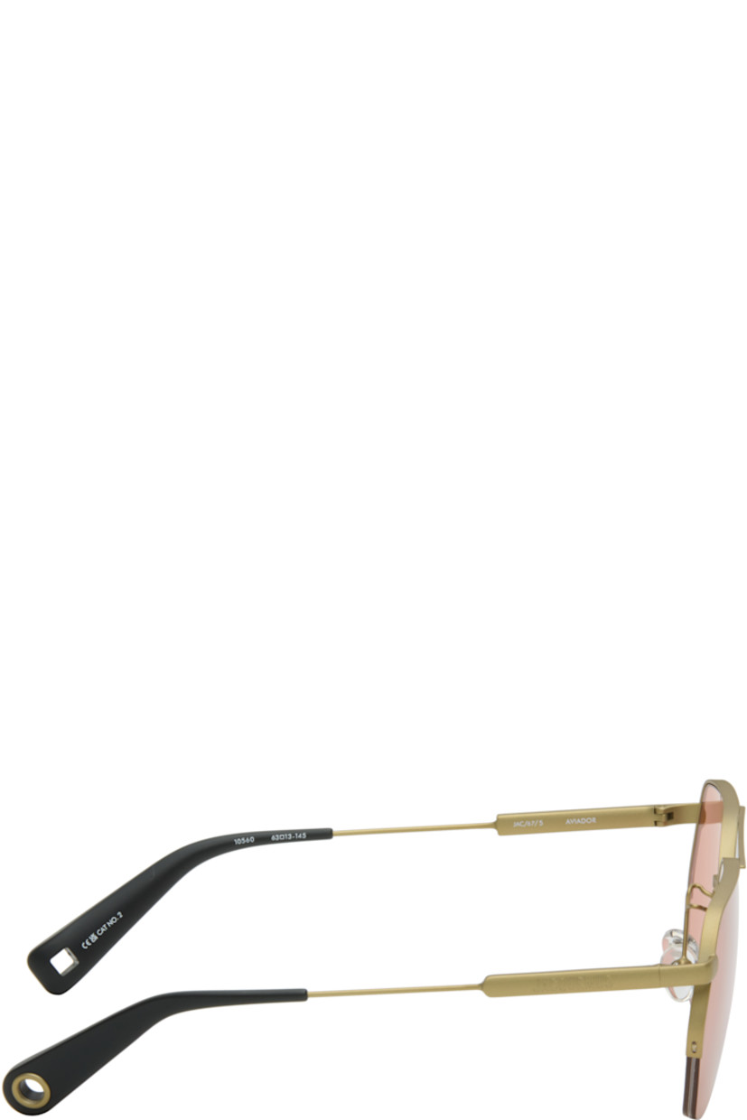 Aviator-style stainless steel frame sunglasses.

· Red lenses 
· 100% UVA/UVB protection, category 2
· Adjustable rubber nose pads
· Double bridge
· Logo engraved at temples
· Black acetate temple tips
· Eyewear chain-compatible
· Includes pouch
· Size: 63.13 145

Part of the La Croisière collection. 

Supplier color: Putty/Black/Amber