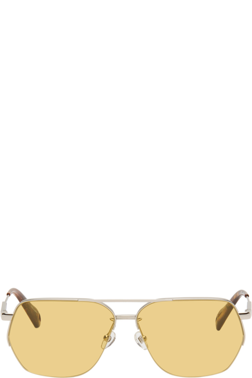 Aviator-style metal-frame sunglasses.

· Yellow lenses
· 100% UVA/UVB protection
· Top bar
· Adjustable rubber nose pads
· Logo engraved at temples
· Eyewear chain-compatible acetate temple tips
· Includes pouch
· Size: 63.13 145

Part of the La Croisière collection.

Supplier color: Silver