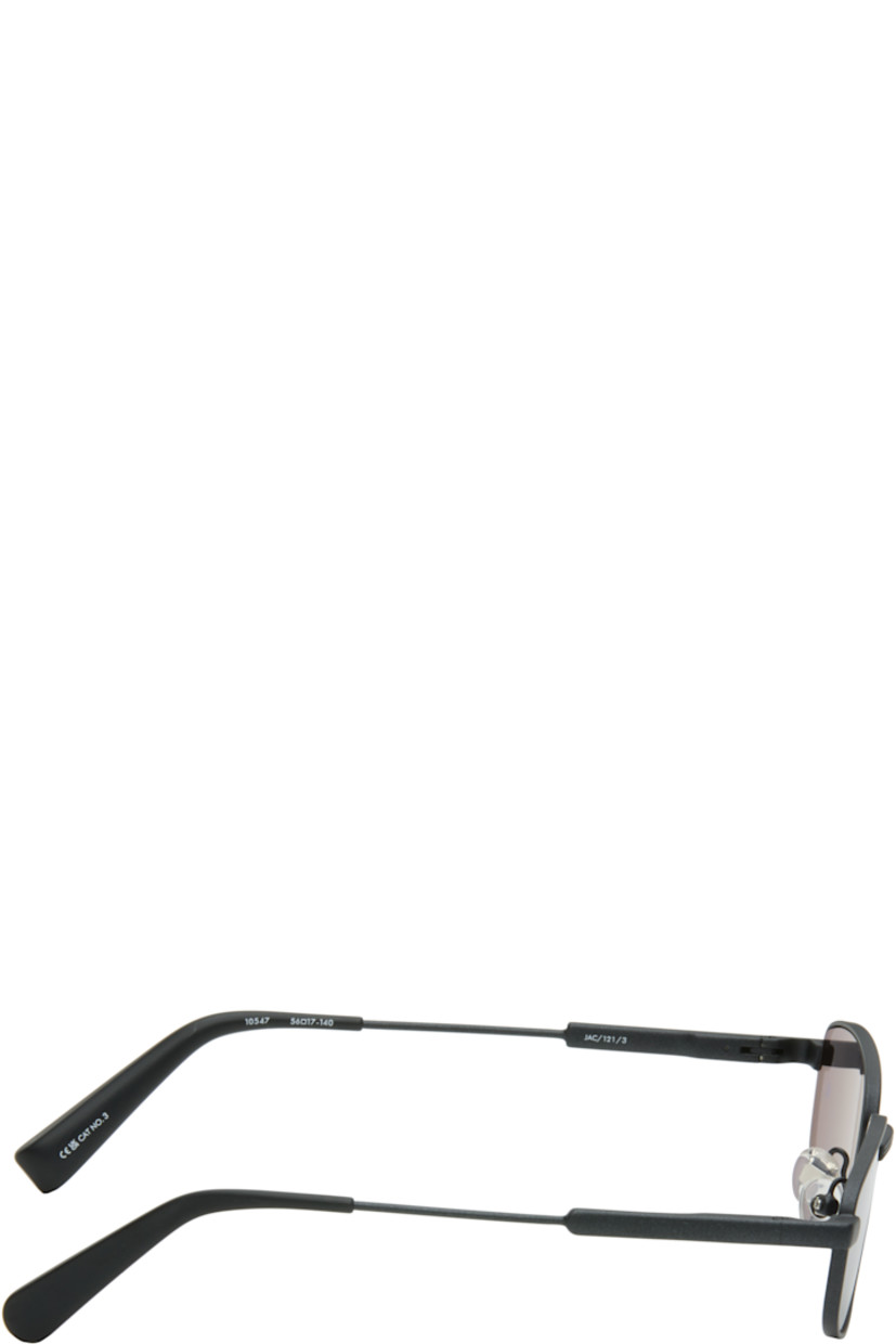 Rectangular stainless steel-frame sunglasses.

· Gray lenses
· 100% UVA/UVB protection, category 3 
· Adjustable rubber nose pads
· Logo etched at temples
· Navy acetate temple tips
· Includes pouch
· Size: 56.17 140

Supplier color: Black matt