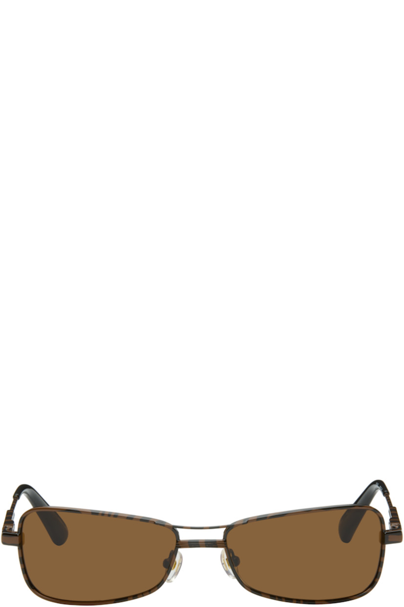 Rectangular metal-frame sunglasses.

· Graphic pattern printed throughout
· Brown lenses 
· Double bridge 
· Adjustable rubber nose pads
· Logo engraved at temples
· Acetate temple tips
· Includes pouch
· Size: 59.17 140

Supplier color: Dark brown zebra