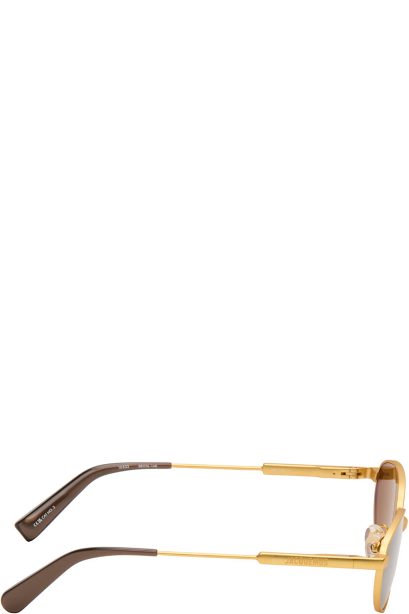Oval metal-frame sunglasses.

· Brown lenses
· 100% UVA/UVB protection
· Adjustable rubber nose pads
· Logo engraved at temples
· Acetate temple tips
· Includes pouch
· Size: 58.16 140

Supplier color: Gold matt