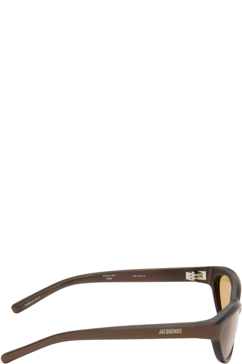 Oval acetate-frame sunglasses.

· Yellow lenses
· 100% UVA/UVB protection
· Integrated nose pads
· Logo printed at temples
· Includes pouch
· Size: 57.16 120

Supplier color: Dark brown matt