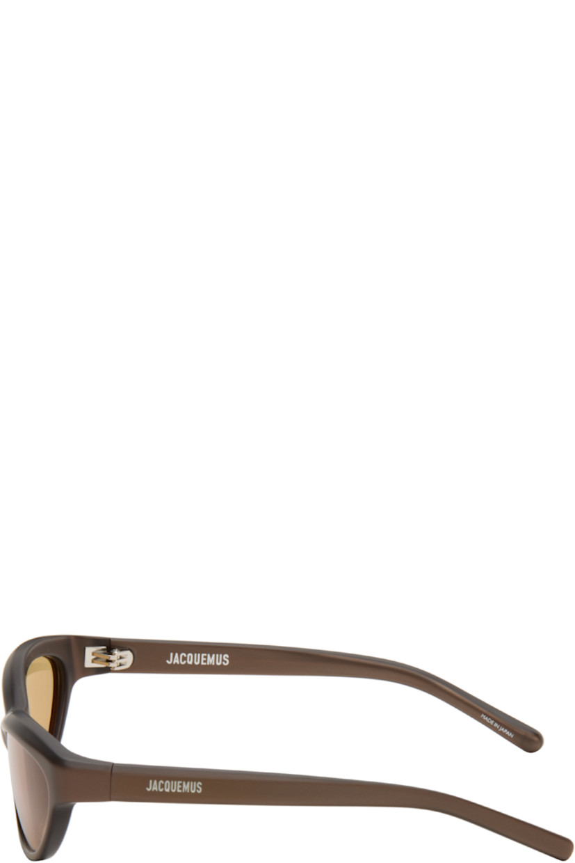 Oval acetate-frame sunglasses.

· Yellow lenses
· 100% UVA/UVB protection
· Integrated nose pads
· Logo printed at temples
· Includes pouch
· Size: 57.16 120

Supplier color: Dark brown matt
