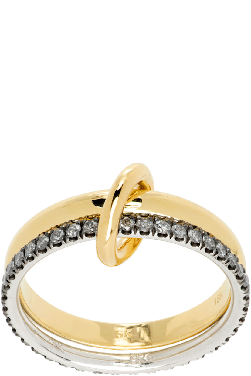 Handcrafted tiered rings in sterling silver and 18k yellow gold.

· Connecting hoop in 18k yellow gold
· Band with pavé-set 0.45 cttw gray diamonds
· Rhodium-plated prongs

Supplier color: Silver/Gold