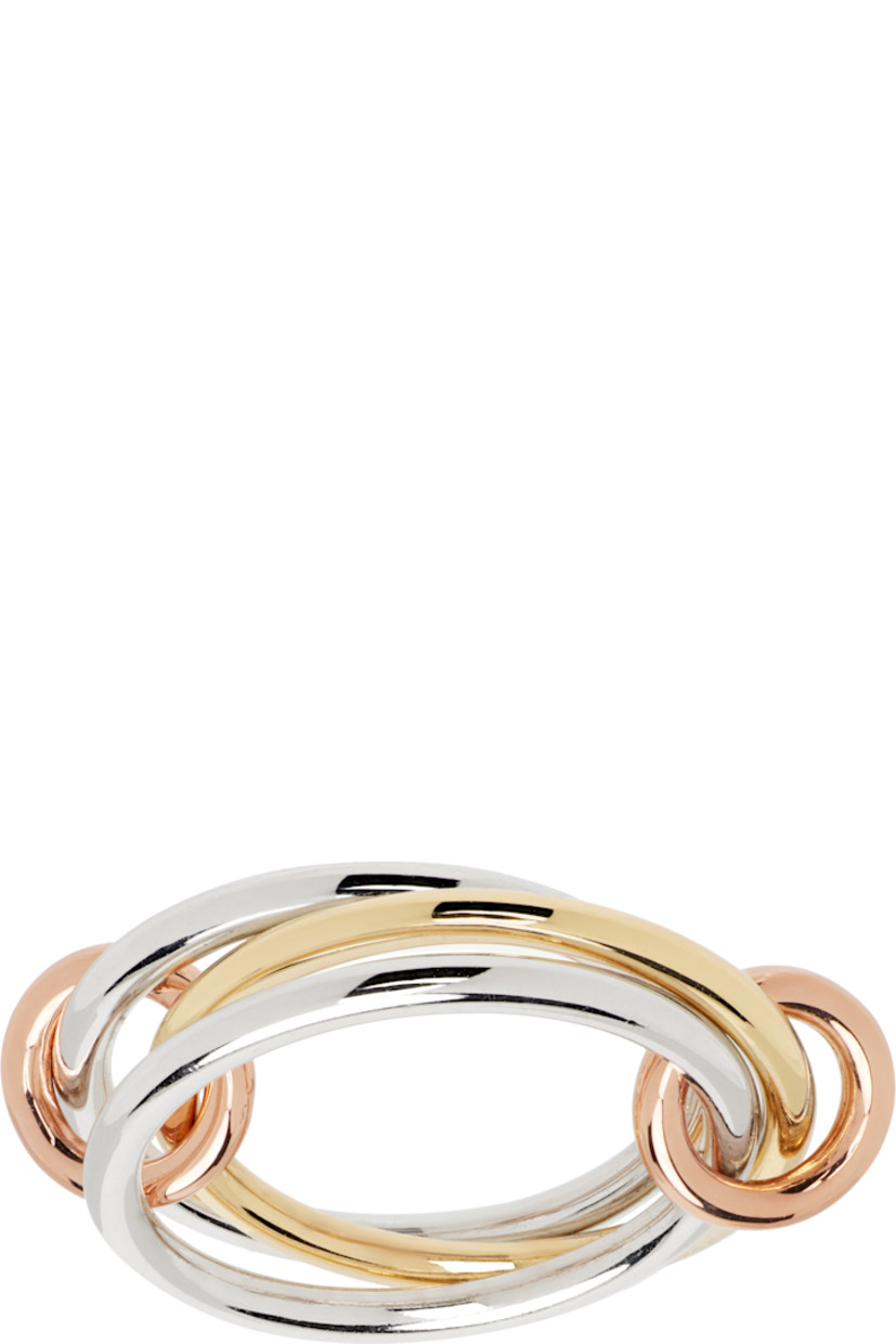 Handcrafted stacked rings in sterling silver and 18k yellow gold.

· Connecting hoops in 18k rose gold
· Hallmarking at inner band

Supplier color: Silver/Gold