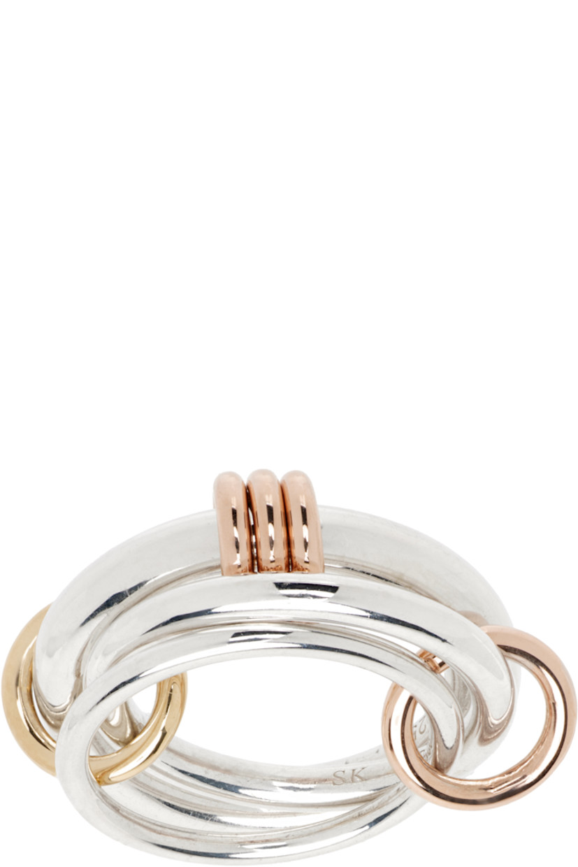 Handcrafted stacked rings in sterling silver.

· Connecting hoops in 18k yellow and rose gold
· Hallmarking at inner band

Supplier color: Silver/Gold