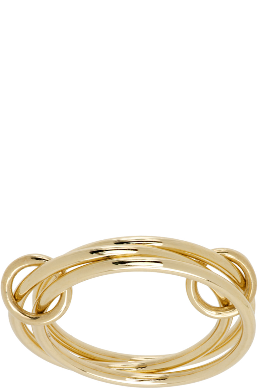 Handcrafted stacked rings in 18k gold. Connecting hoops at length.

Supplier color: Yellow gold