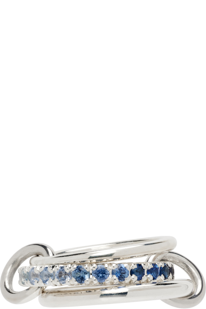 Handcrafted stacked rings in sterling silver.

· Connecting hoops at length
· Pavé-set gradient blue 1.40 cttw sapphires
· Hallmarking at inner band

Supplier color: Silver