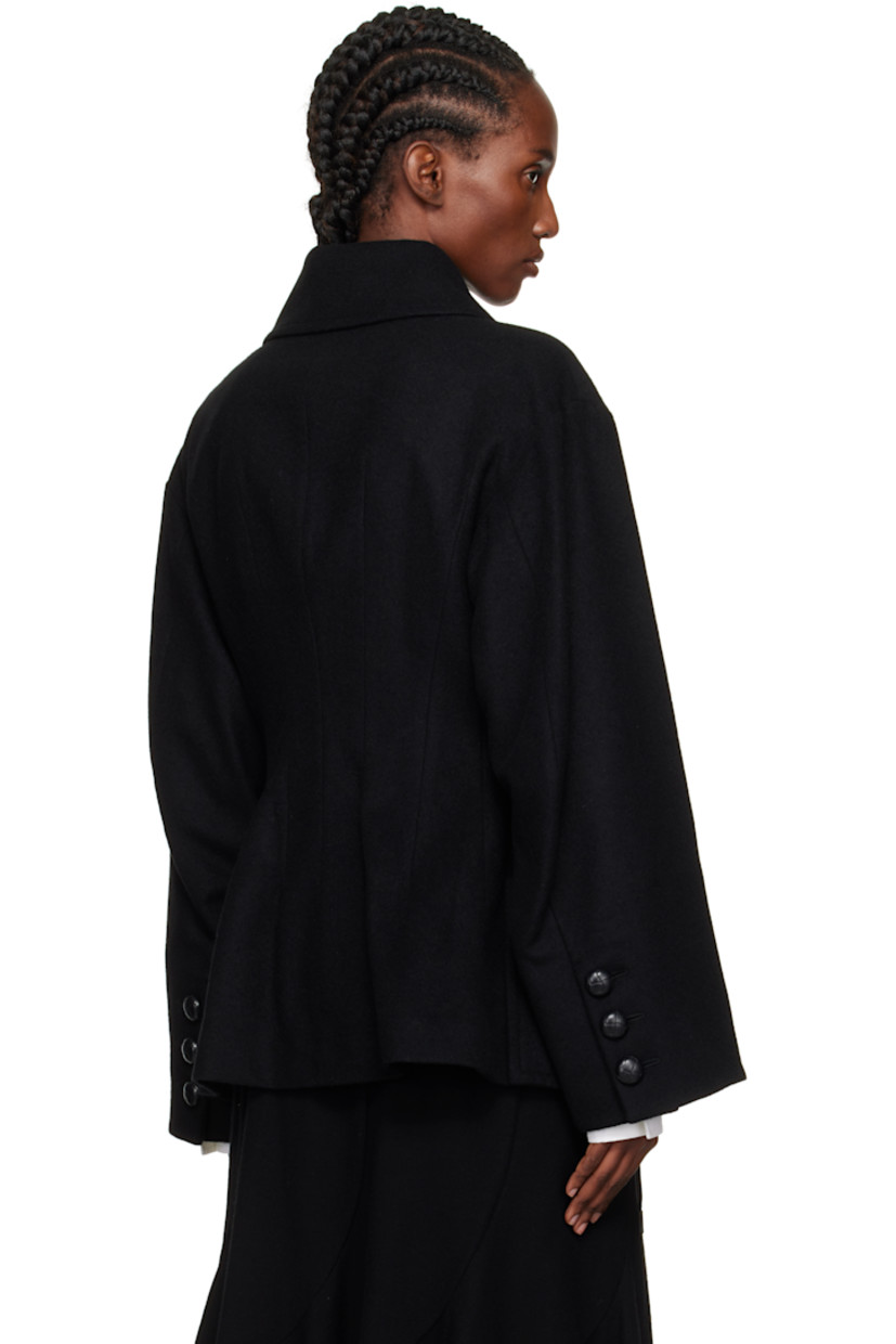 Wool-blend melton coat.

· Darts throughout
· Spread collar
· Double-breasted button closure
· Patch pockets at front
· Dropped shoulders
· Surgeon's cuffs
· Darts at back
· Full satin lining

Supplier color: Black