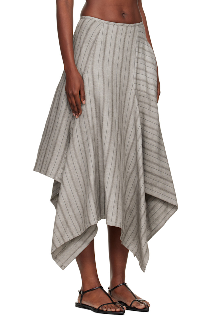 Cotton- and linen-blend herringbone midi skirt.

· Stripes throughout
· Asymmetrical construction
· Single-pocket styling
· Handkerchief hem
· Zip closure at back

Supplier color: Grey