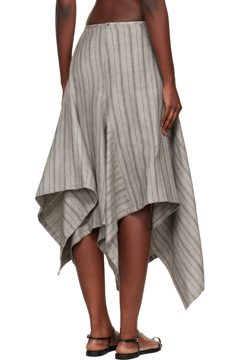 Cotton- and linen-blend herringbone midi skirt.

· Stripes throughout
· Asymmetrical construction
· Single-pocket styling
· Handkerchief hem
· Zip closure at back

Supplier color: Grey