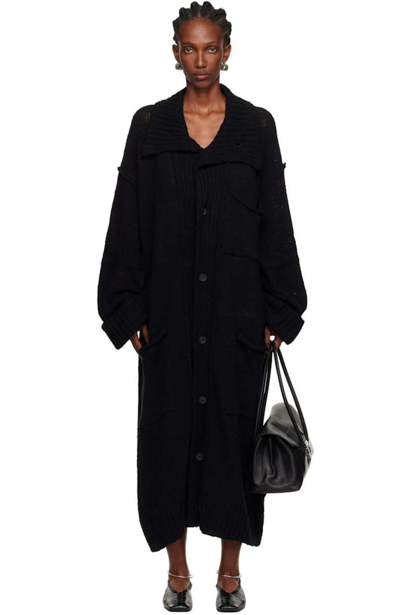 Knit cotton cardigan.

· Rib-knit funnel neck, hem, and cuffs
· Button closure
· Patch pockets at front
· Dropped shoulders

Part of the Yohji Yamamoto POUR HOMME collection.

Supplier color: Black