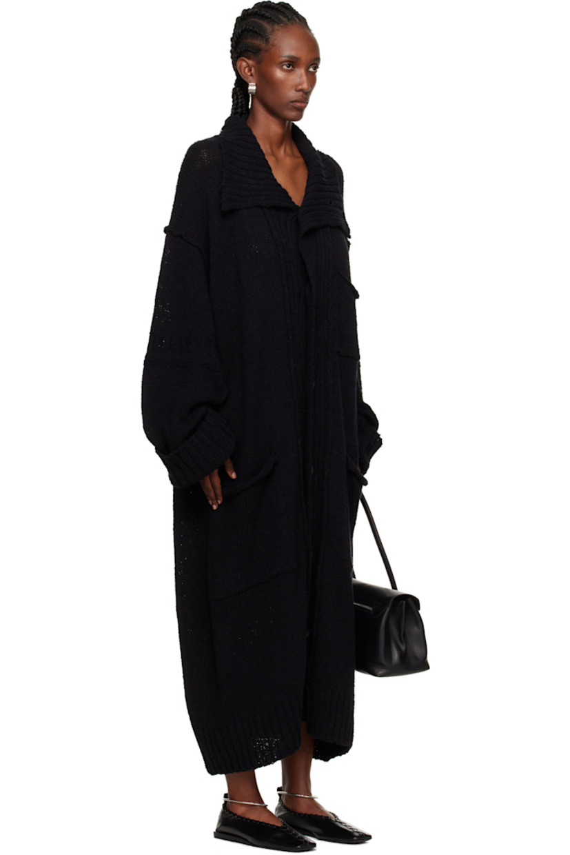 Knit cotton cardigan.

· Rib-knit funnel neck, hem, and cuffs
· Button closure
· Patch pockets at front
· Dropped shoulders

Part of the Yohji Yamamoto POUR HOMME collection.

Supplier color: Black