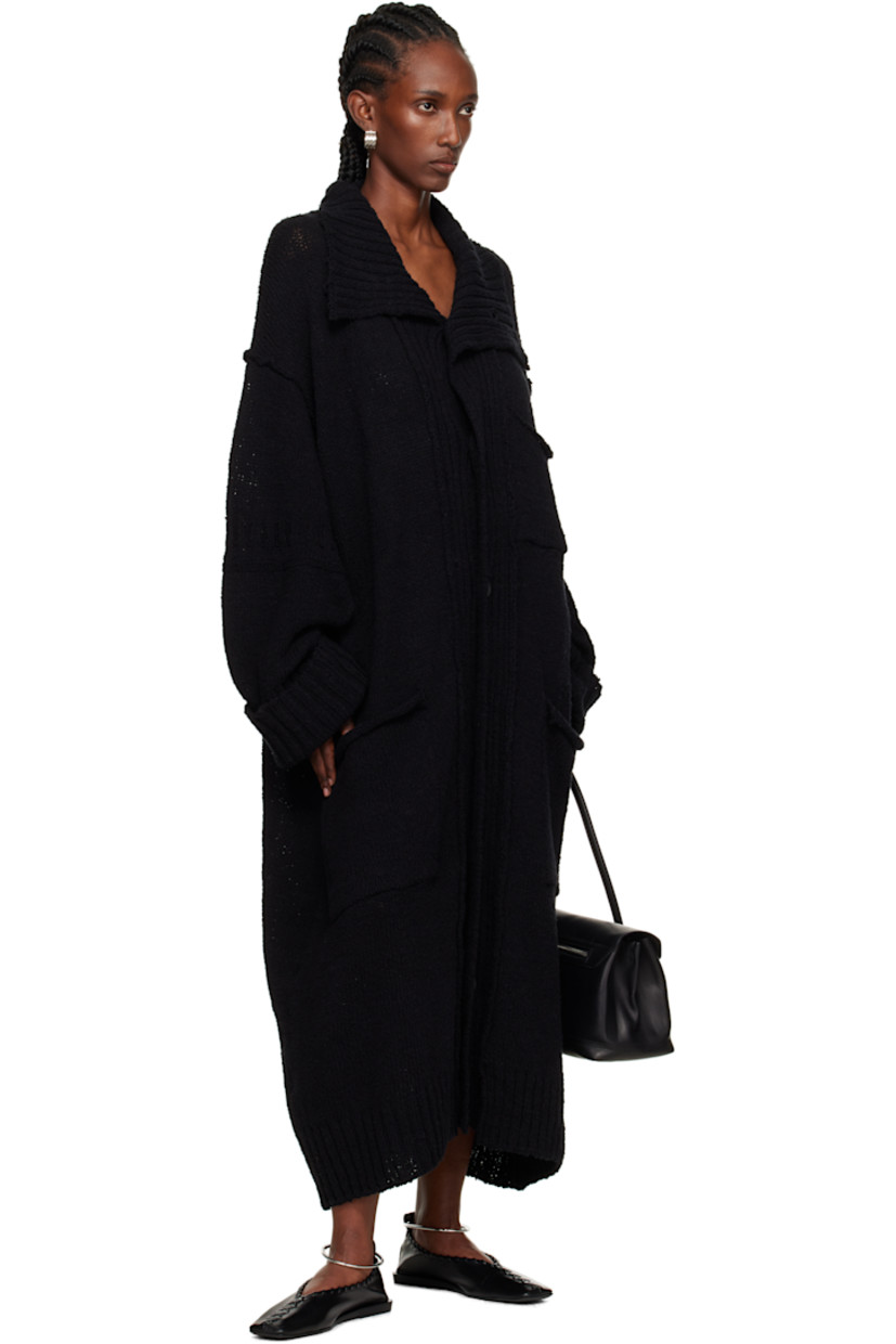 Knit cotton cardigan.

· Rib-knit funnel neck, hem, and cuffs
· Button closure
· Patch pockets at front
· Dropped shoulders

Part of the Yohji Yamamoto POUR HOMME collection.

Supplier color: Black