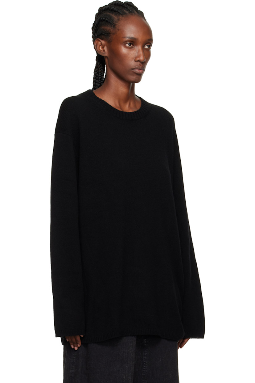 Knit wool sweater.

· Rib-knit crewneck, hem, and cuffs
· Braided extended trim at hem side seam
· Dropped shoulders

Part of the Yohji Yamamoto POUR HOMME collection.

Supplier color: Black