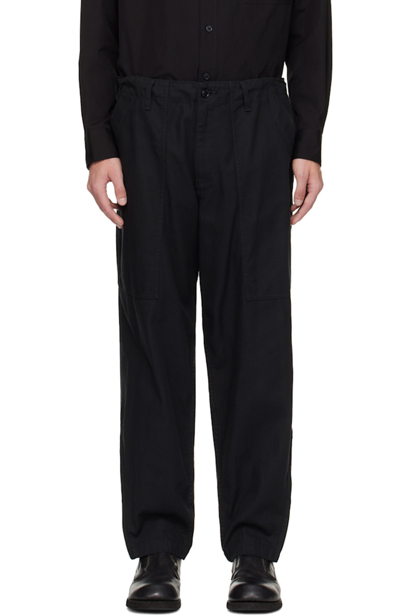 Cotton herringbone trousers.

· Concealed drawstring at waistband
· Belt loops
· Four-pocket styling
· Zip fly
· Zip expansion panel at cuffs
· Logo flag at back pocket

Part of the Yohji Yamamoto POUR HOMME collection.

Supplier color: Black