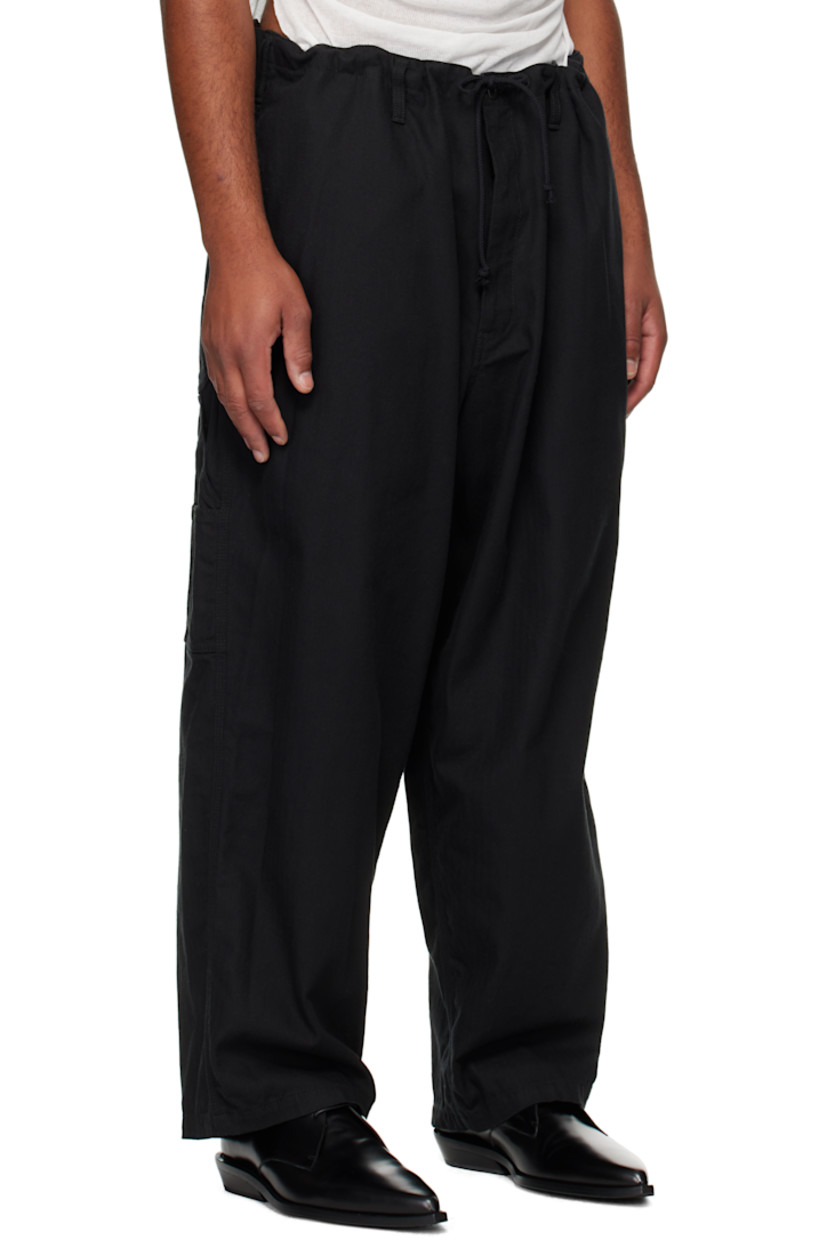Cotton herringbone trousers.

· Drawstring at waistband 
· Belt loops
· Four-pocket styling
· Zip fly 
· Hammer loop and patch pocket at outseams

Supplier color: Black