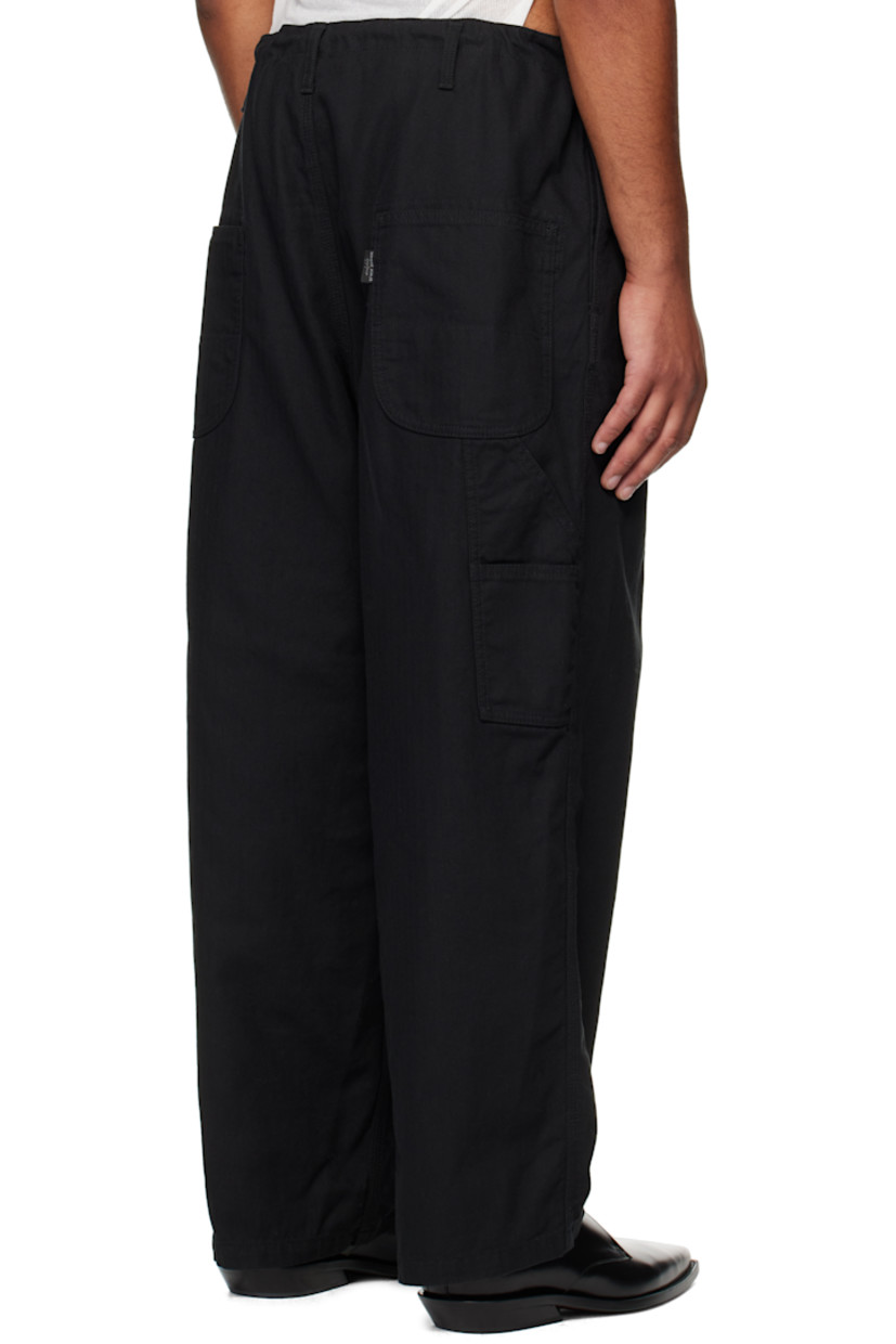 Cotton herringbone trousers.

· Drawstring at waistband 
· Belt loops
· Four-pocket styling
· Zip fly 
· Hammer loop and patch pocket at outseams

Supplier color: Black